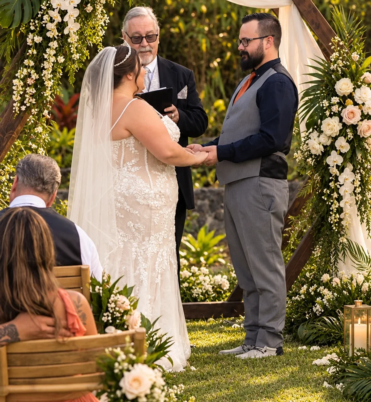 Couple exchanging vows during a Koa’s lawn ceremony